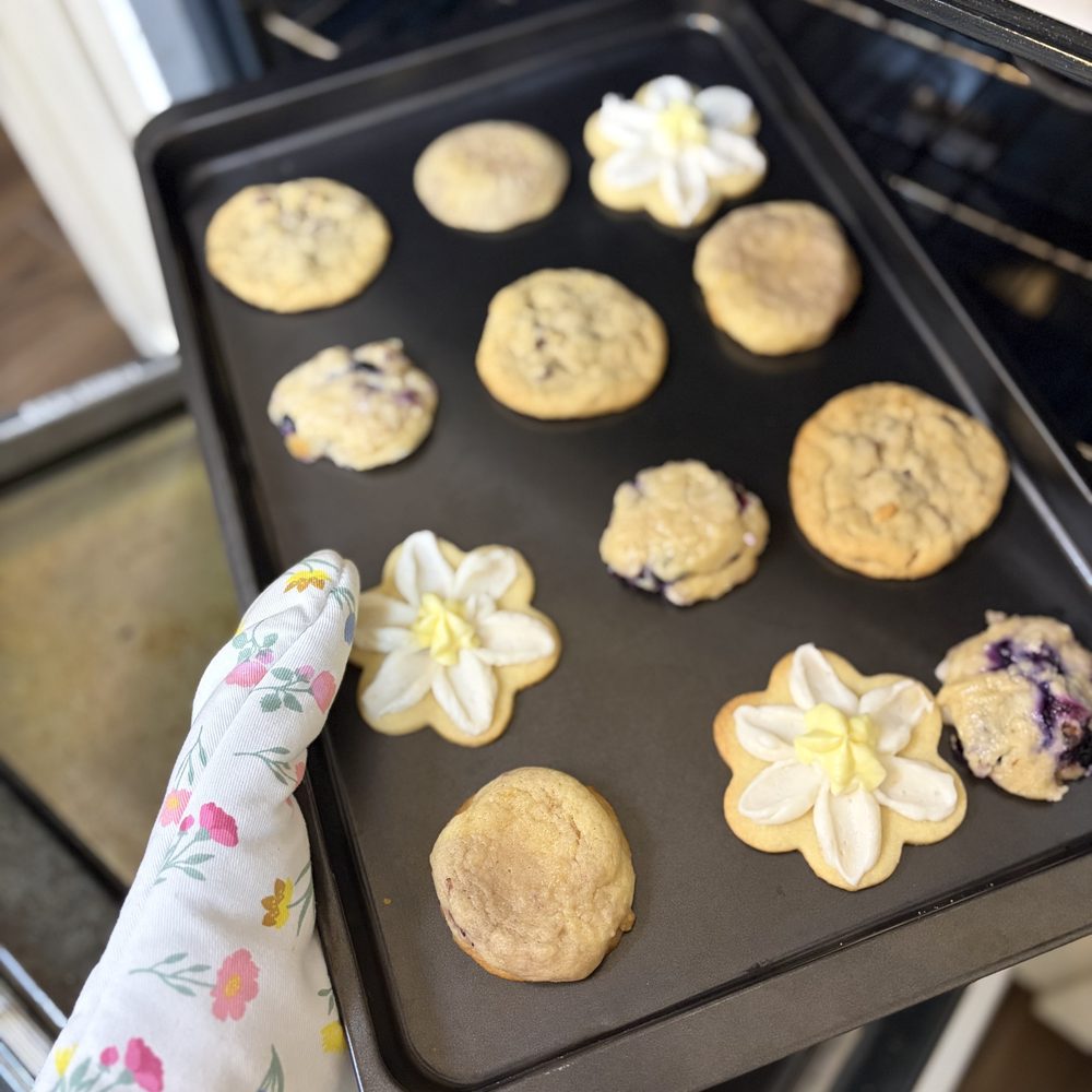A fresh tray of cookies coming out of the oven